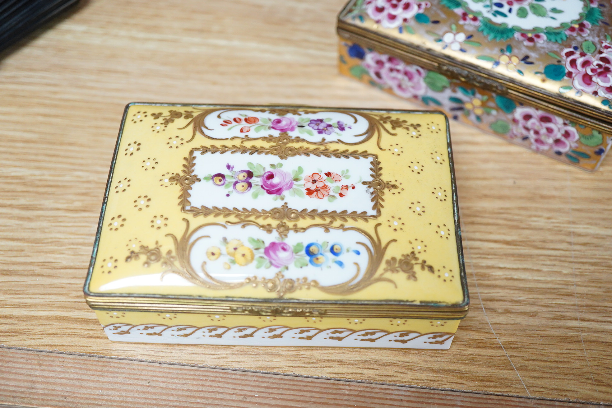Two rectangular gilt mounted French porcelain trinket boxes, 12cm x8cm